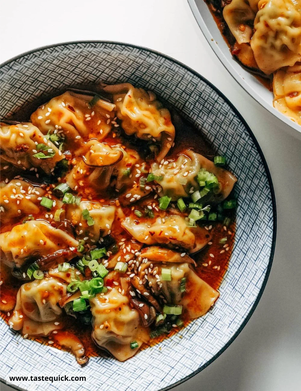 Chicken Wontons in Spicy Chili Sauce