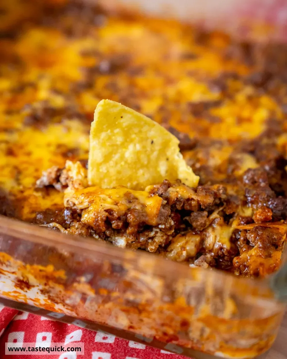 Creamy and cheesy football dip served in a bowl for game day snacks