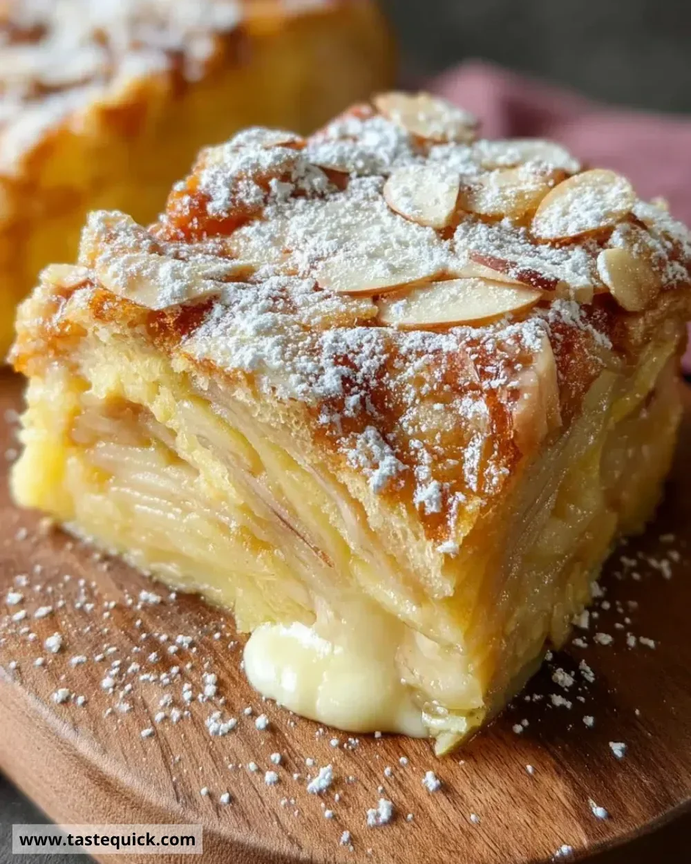 Slice of French Apple Invisible Cake showcasing a fluffy apple dessert