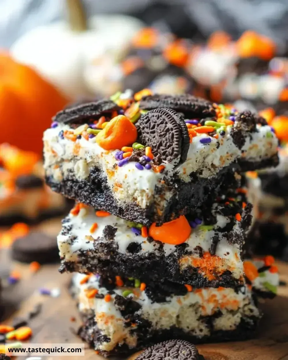 Halloween Oreo Cake Bars decorated with festive toppings and spooky designs