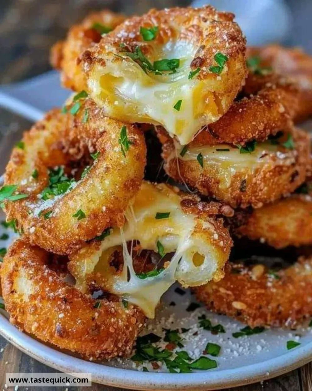 Jalapeño popper stuffed onion rings on a platter