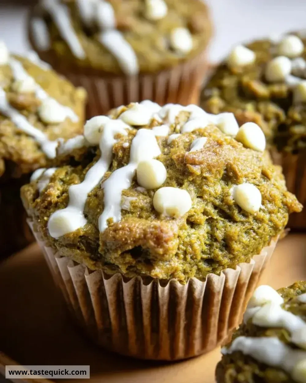 Matcha white chocolate pumpkin muffins baked to perfection in a cozy kitchen