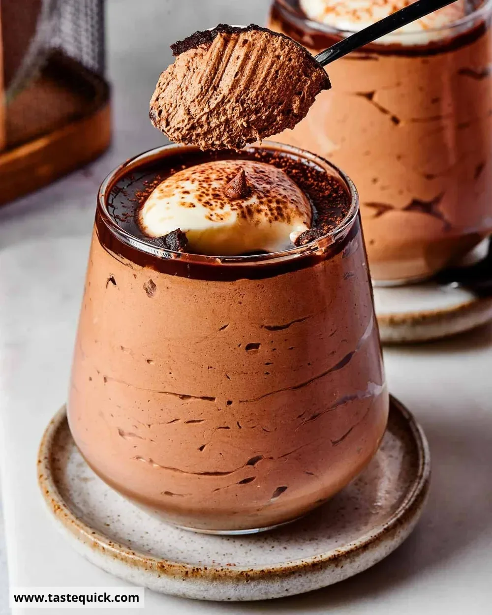 Delicious no-bake coffee mousse dessert topped with whipped cream.