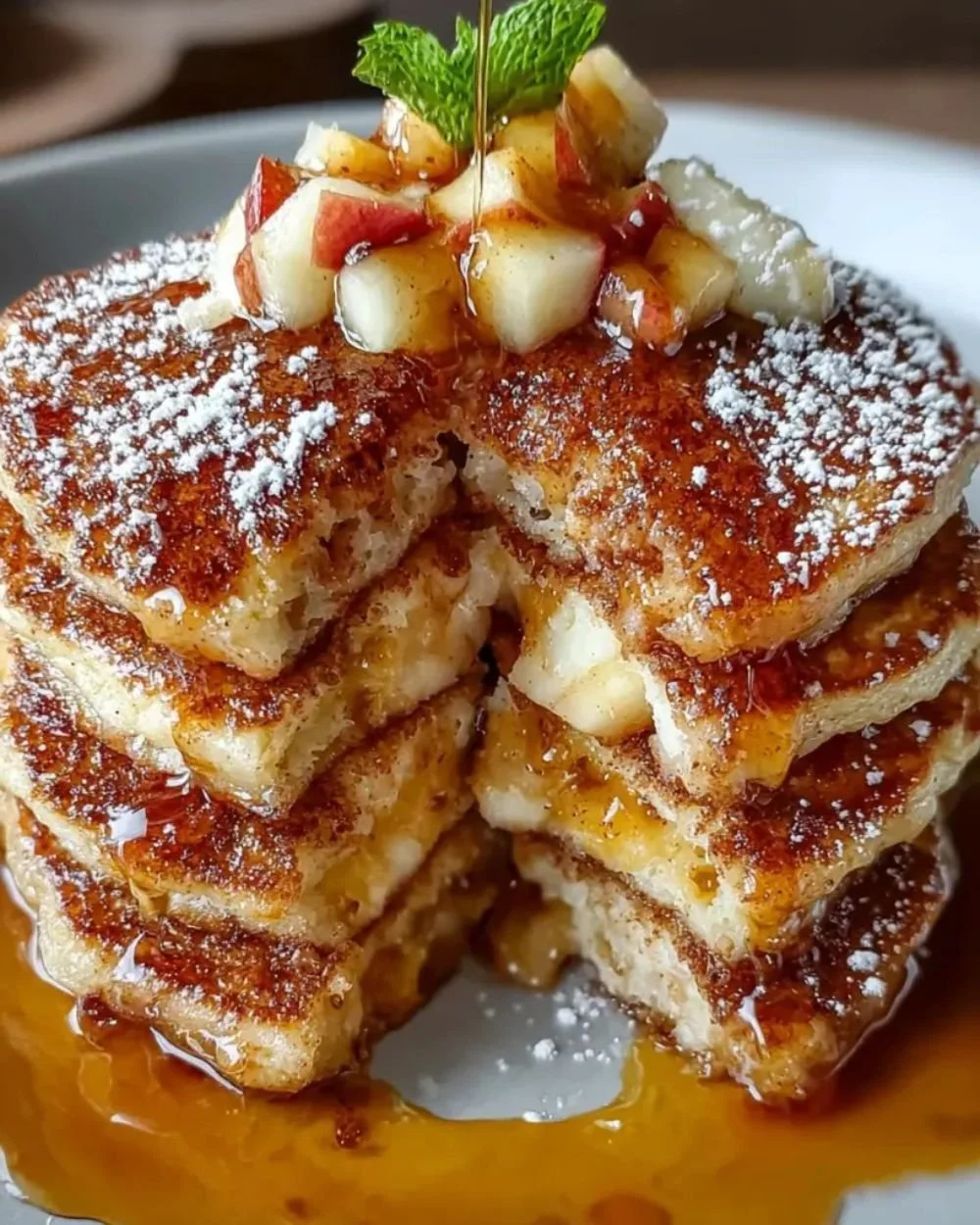 Delicious apple pie pancakes served with vanilla maple syrup