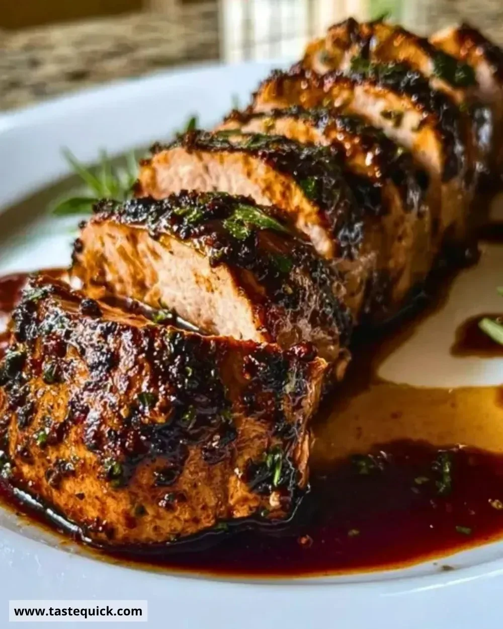 Balsamic Pork Tenderloin served with vegetables on a plate
