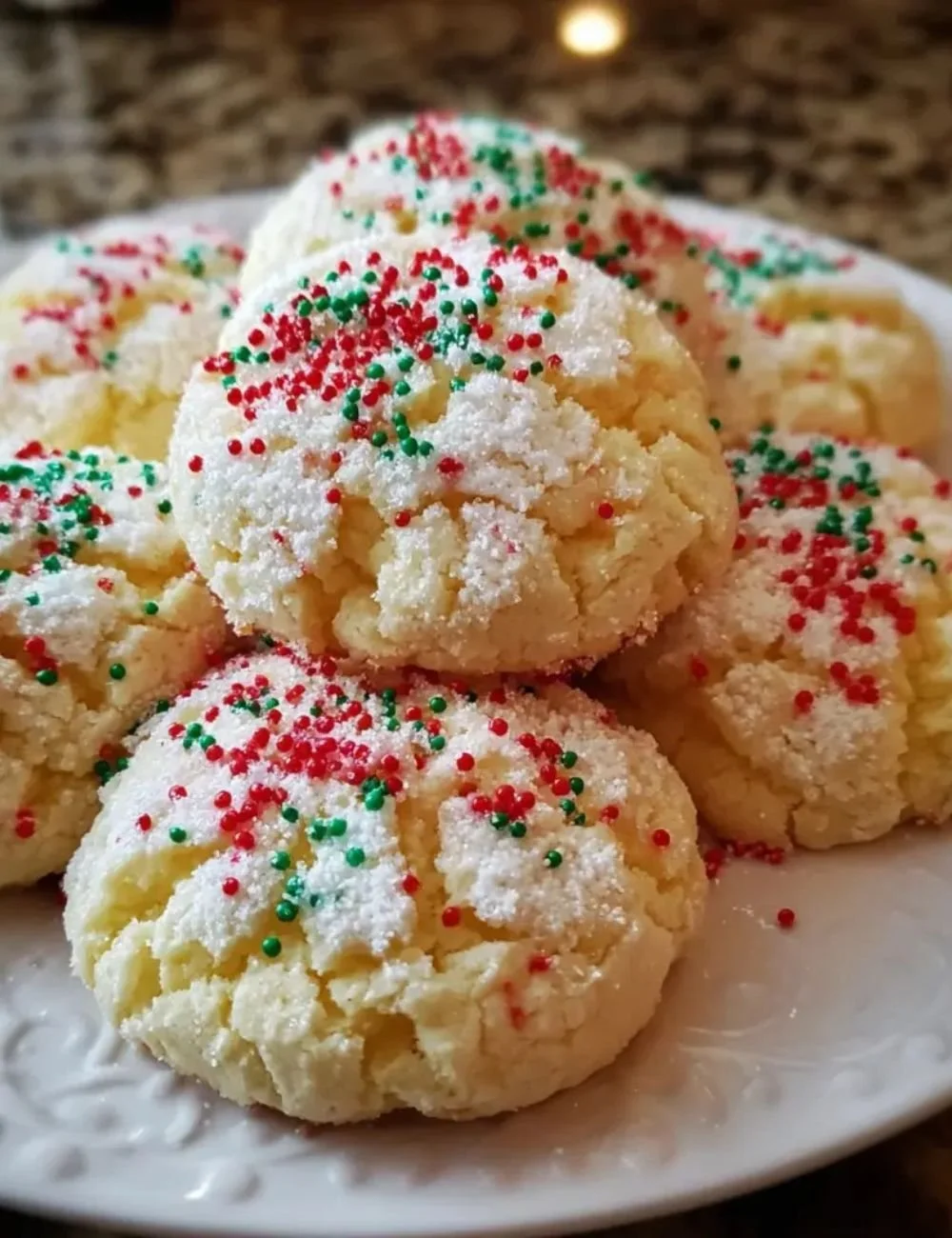 Christmas Ooey Gooey Butter Cookies on a festive plate