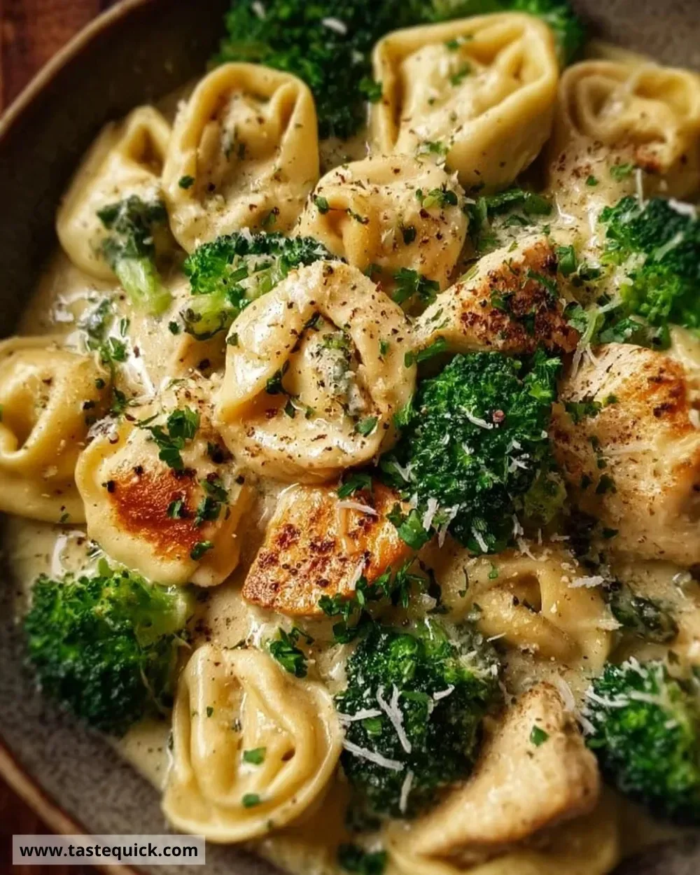Creamy garlic parmesan tortellini dish with chicken and broccoli