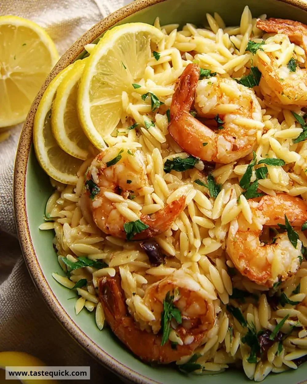 A delicious bowl of Lemon Shrimp Orzo with vibrant colors and fresh ingredients