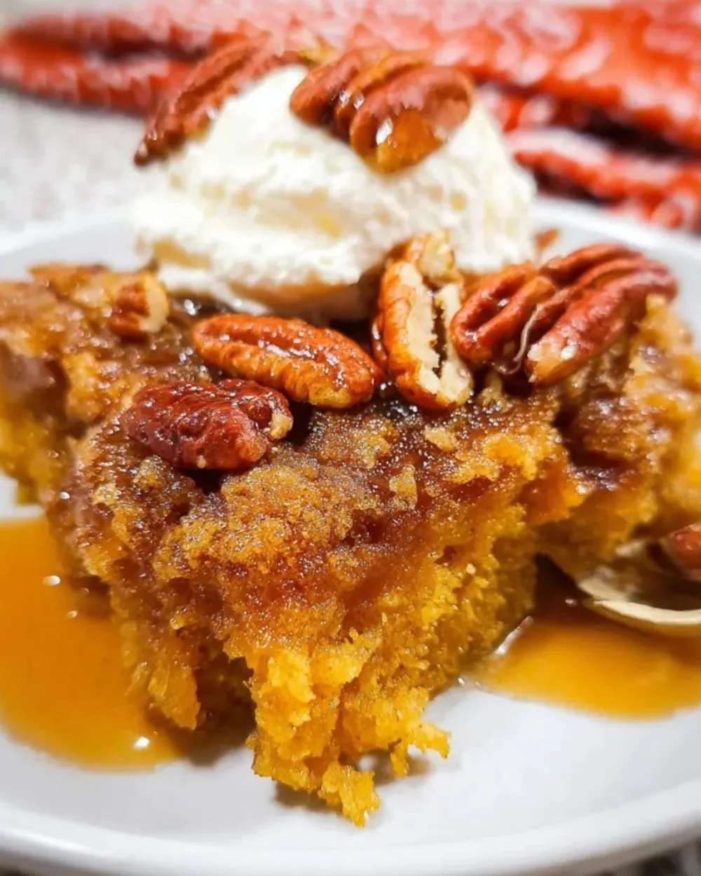 Delicious Pumpkin Pecan Cobbler served in a rustic dish with autumn decor.