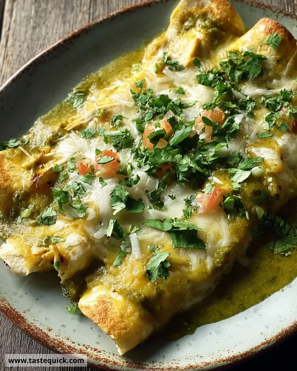 Delicious Swiss enchiladas topped with cheese and sauce