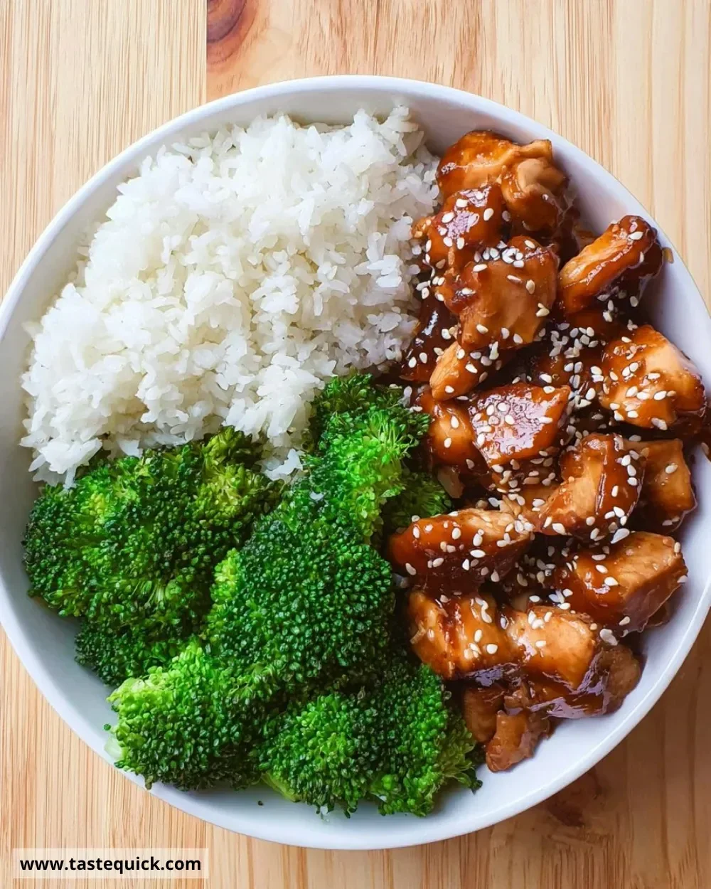 Delicious Teriyaki Chicken Rice Bowl served with vegetables and sesame seeds