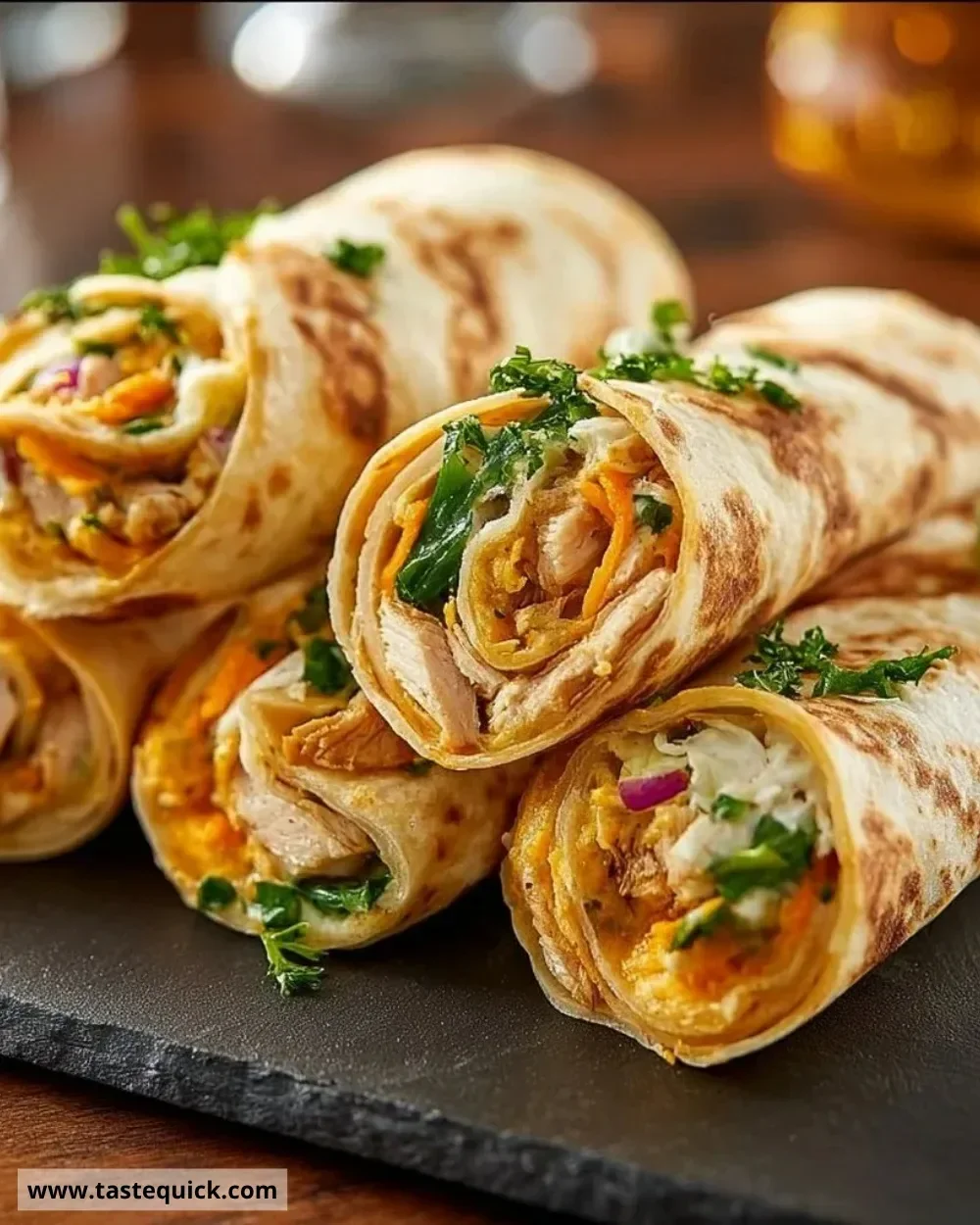 Delicious tortilla roll-ups filled with fresh ingredients and served on a plate