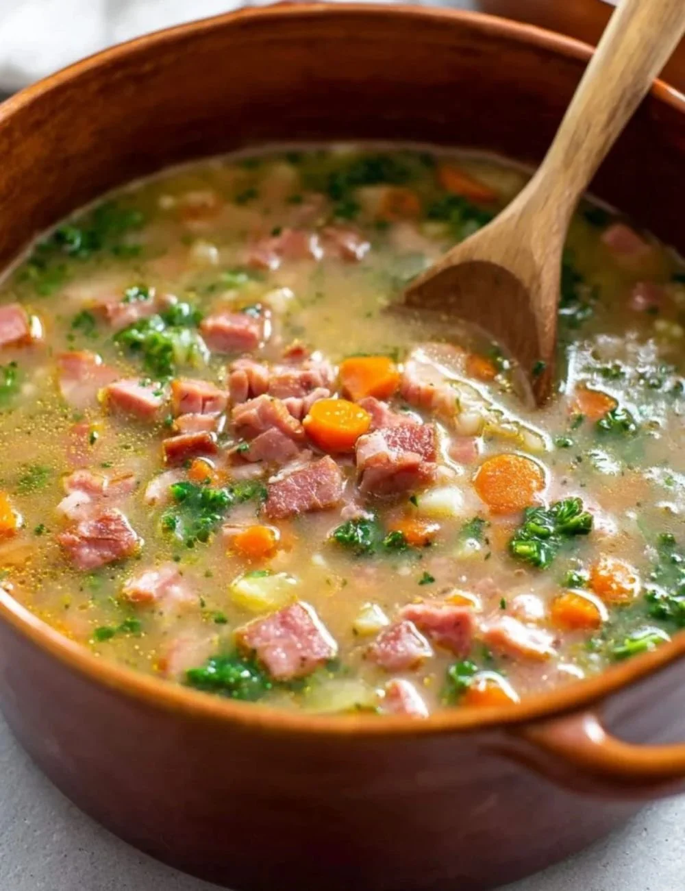 Bowl of cozy ham soup made with fresh ingredients