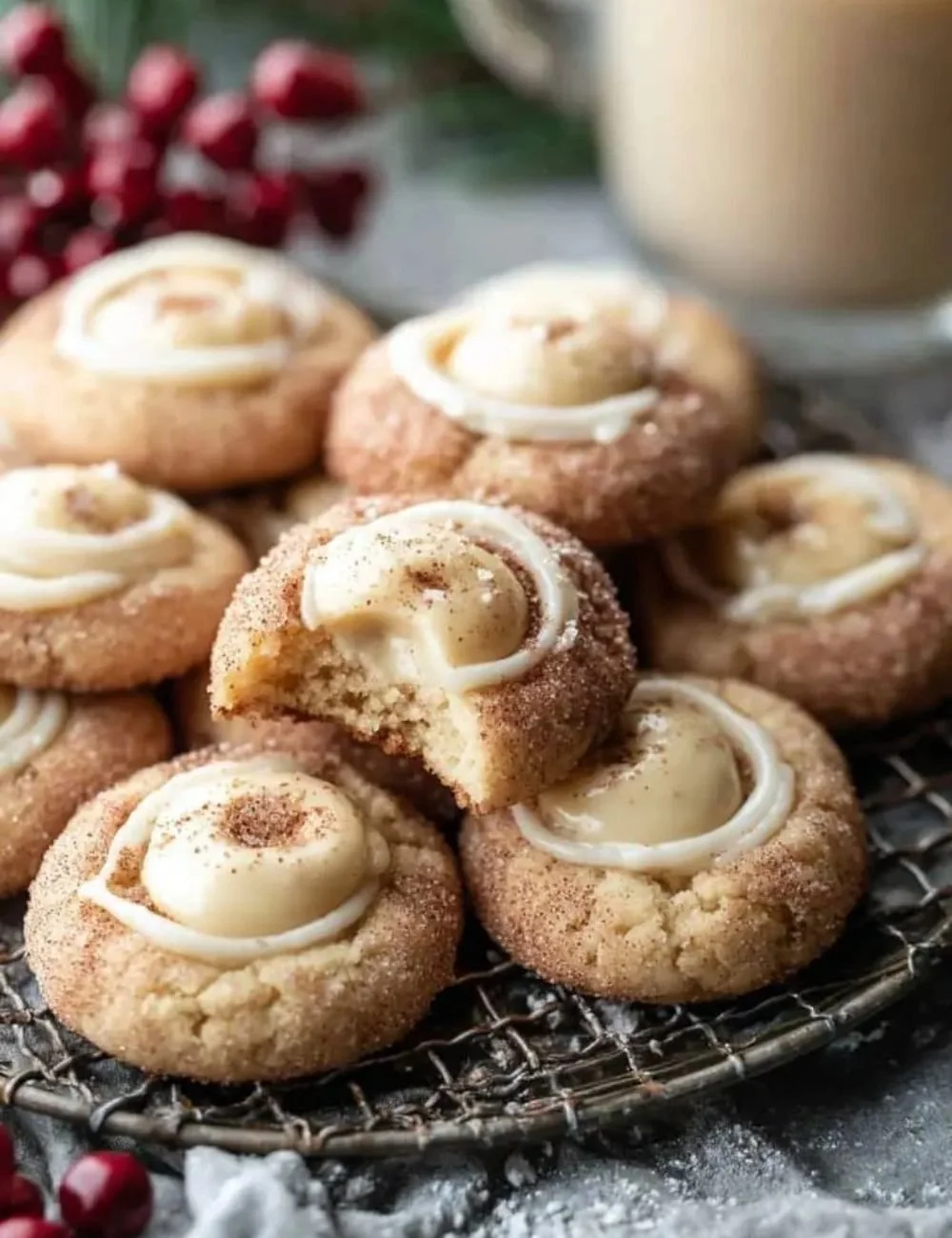 Eggnog Snickerdoodle Thumbprint Cookies on a festive plate