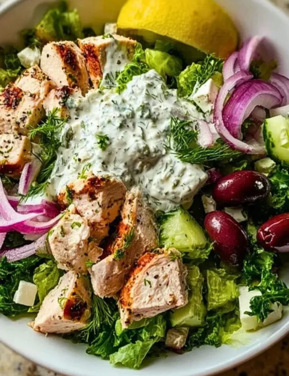 Greek Tzatziki Chicken Salad Bowl with fresh ingredients