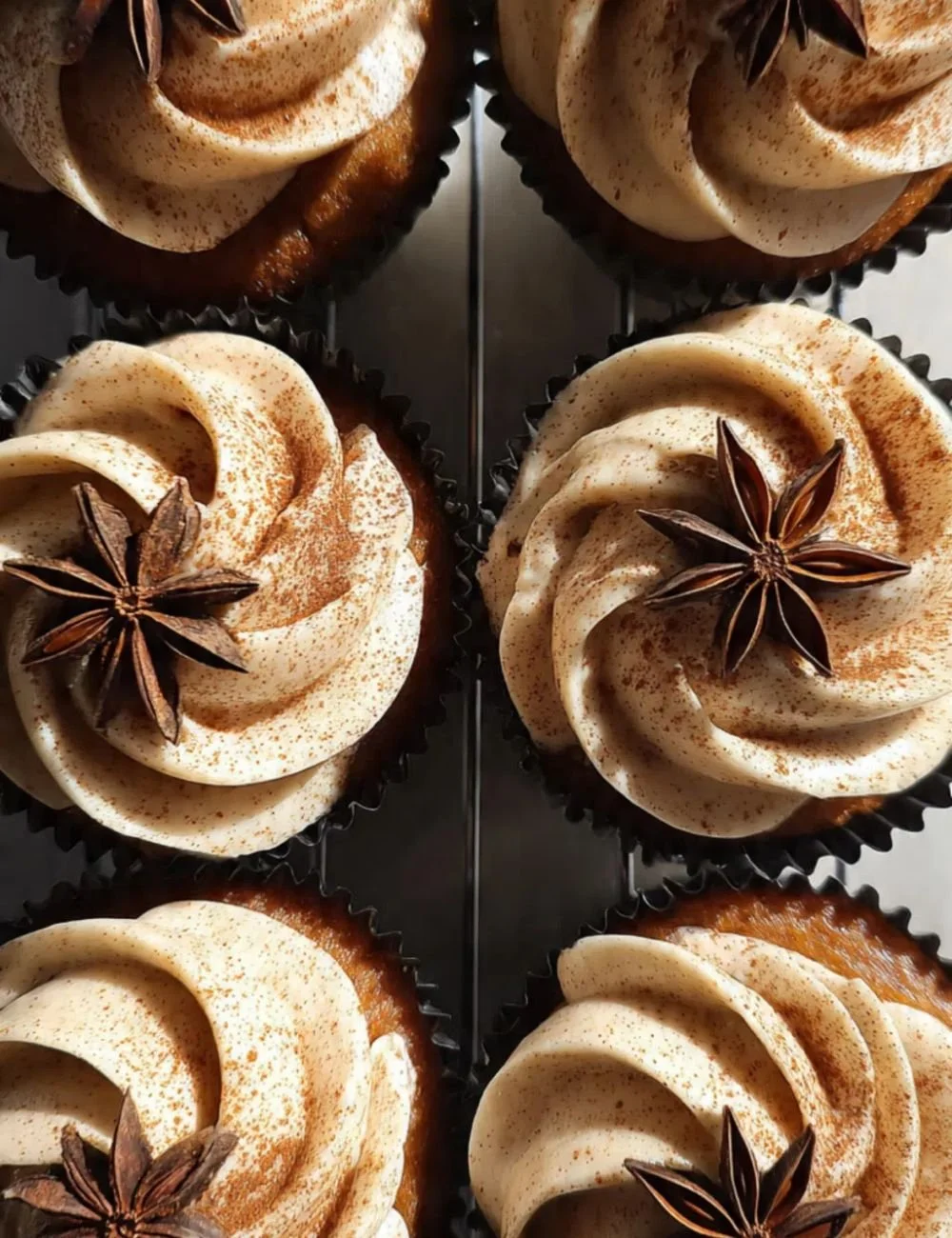 Delicious latte cupcakes topped with creamy coffee frosting and coffee beans.