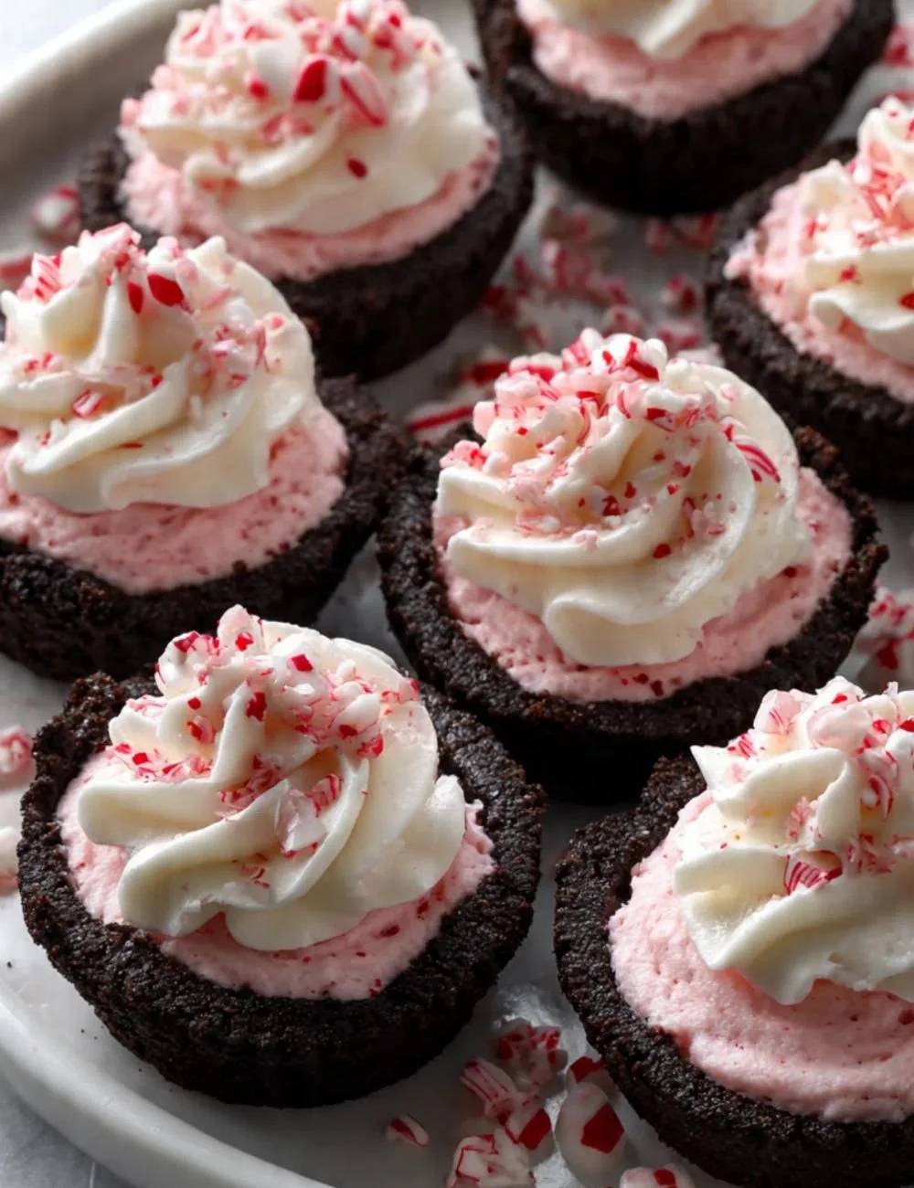 Delicious Peppermint Oreo Cups topped with mint and chocolate