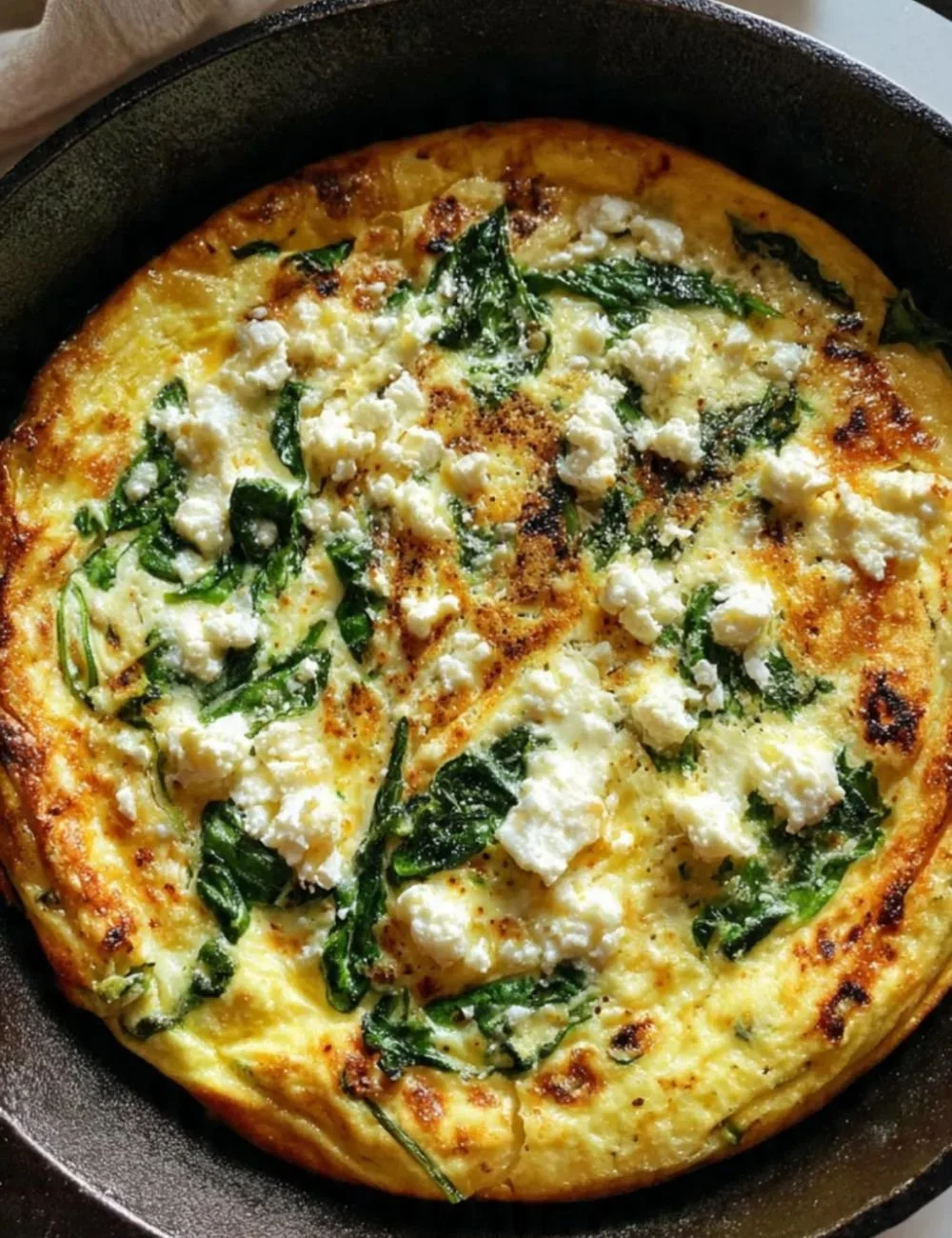Delicious Sheet Pan Spinach and Feta Omelette ready to serve