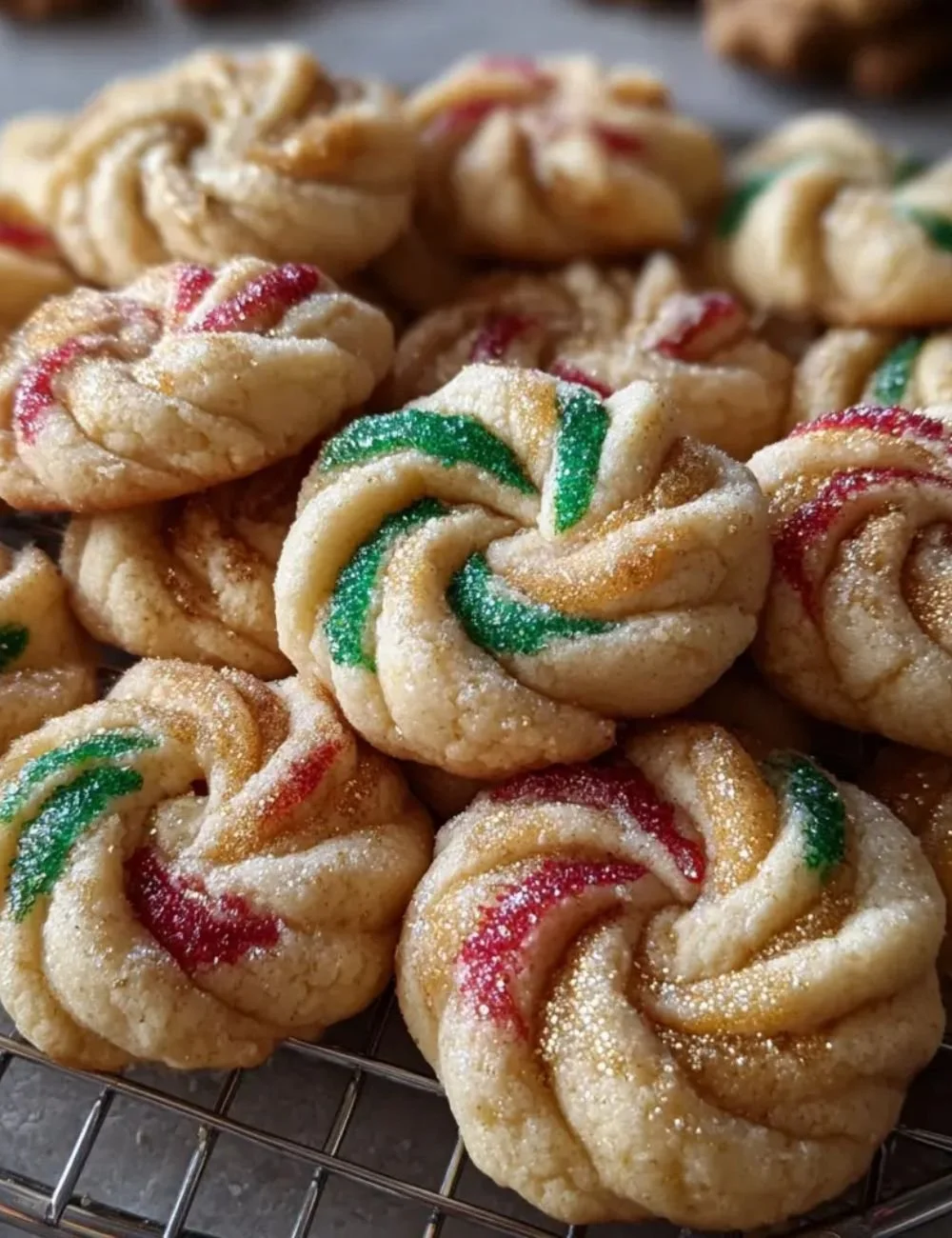 Twisted Christmas Cookies decorated with festive icing and sprinkles