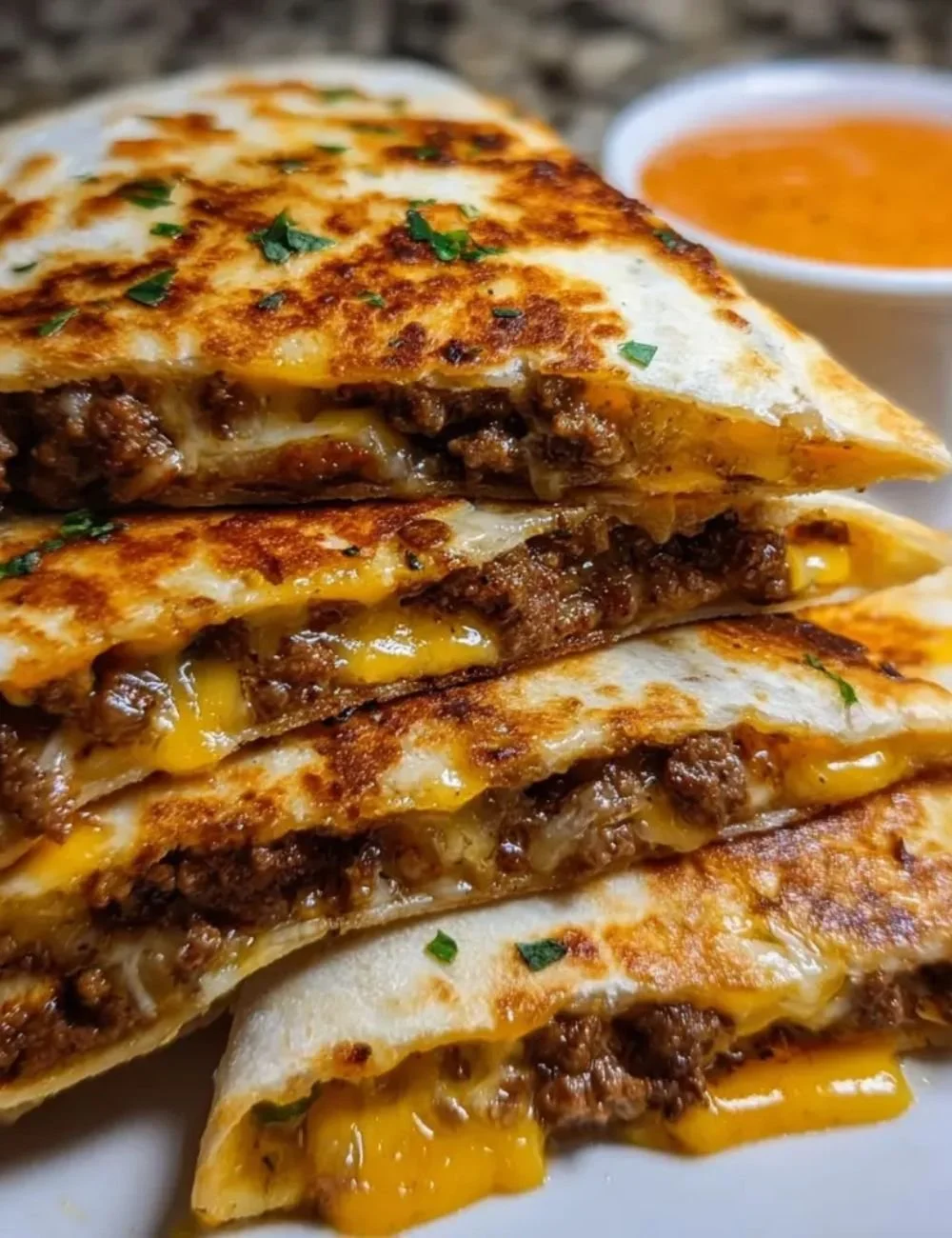 Delicious Cowboy Butter Smashed Beef Tortilla Melts served on a plate
