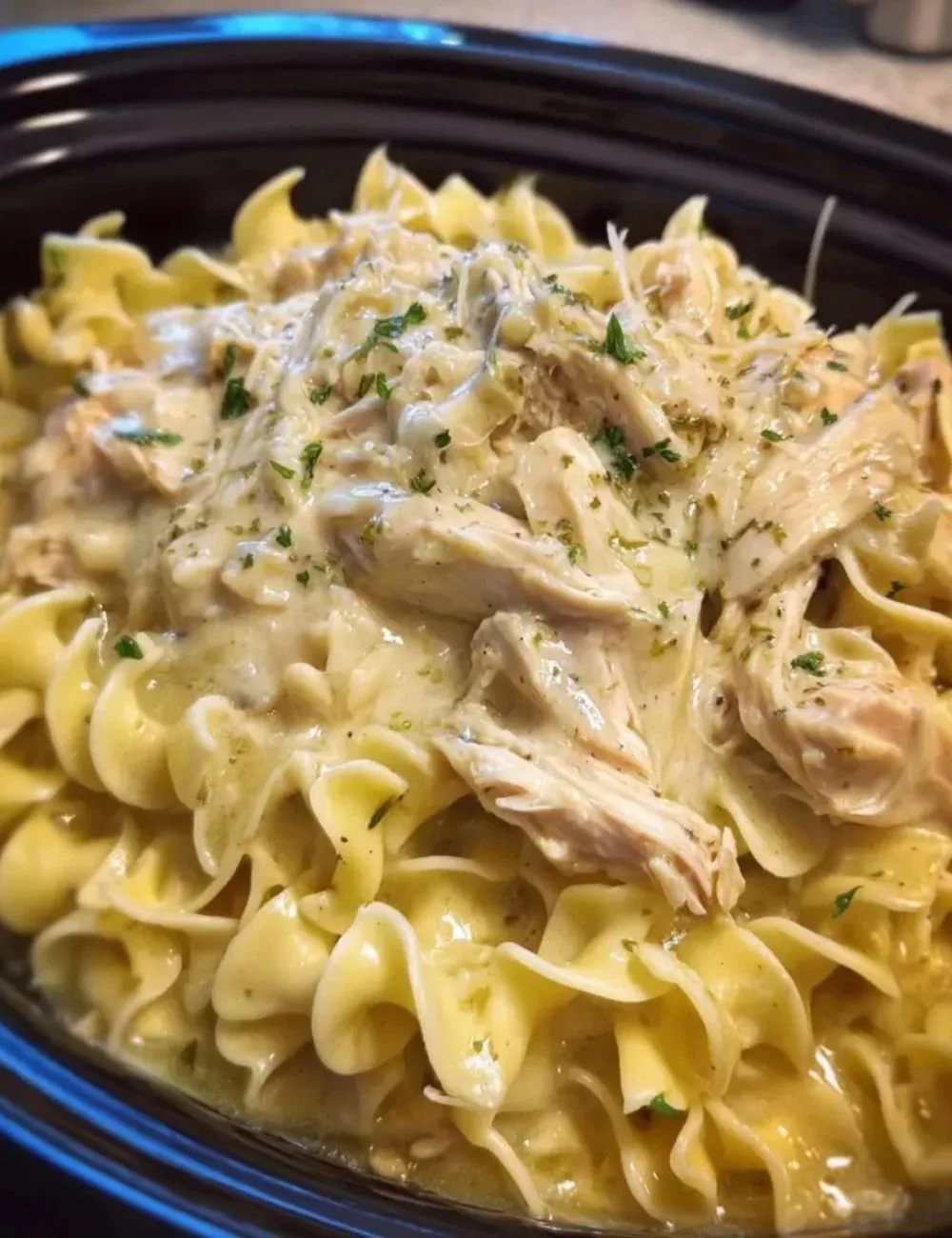 Crockpot Chicken and Noodles dish served in a bowl