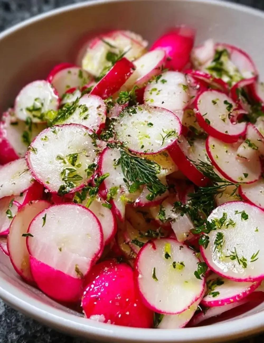 Gordon Ramsay's vibrant radish salad with fresh ingredients and colorful presentation.