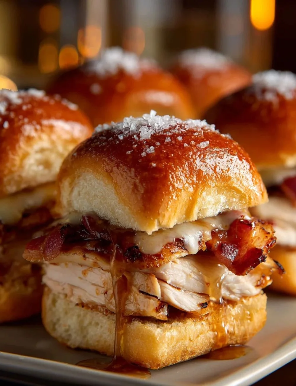 Maple Chicken Sliders with beef bacon served on a platter