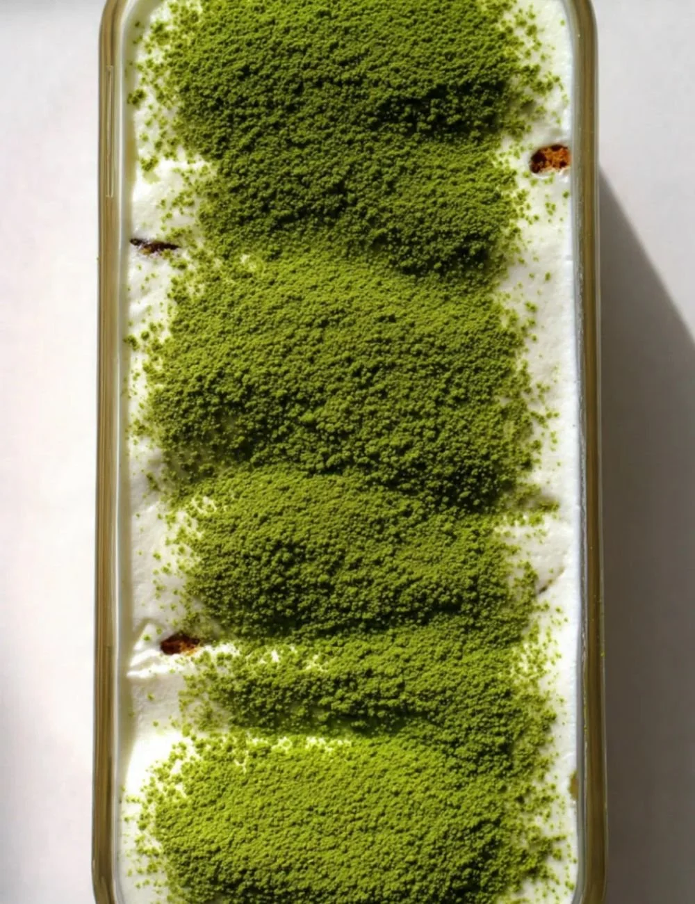 Matcha Cherry Tiramisu with layers of cream, cherries, and panettone