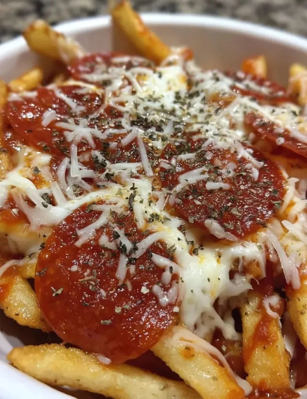 Delicious Pepperoni Pizza Fries topped with cheese and pepperoni
