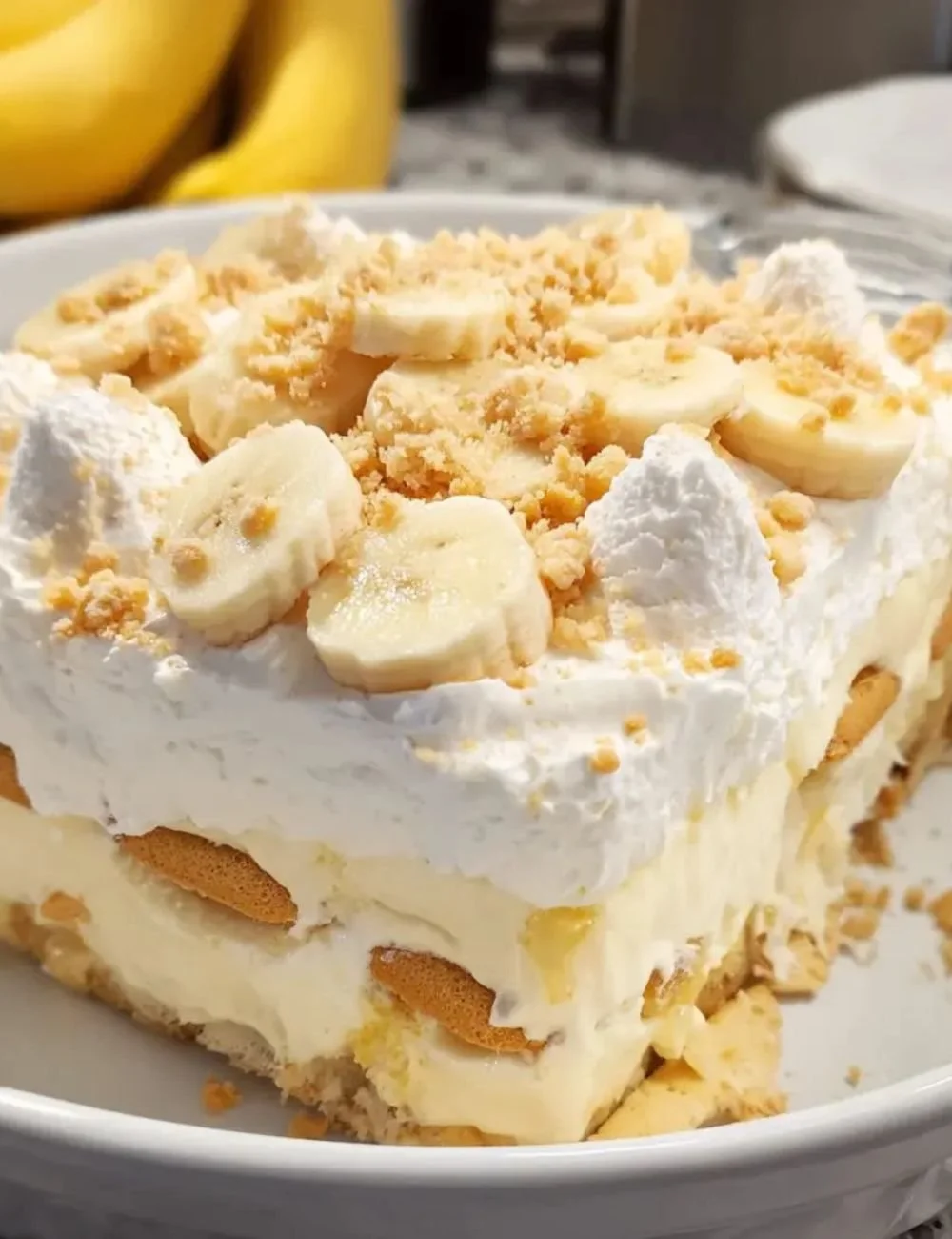 A mouthwatering Banana Delight dessert with bananas and creamy layers.