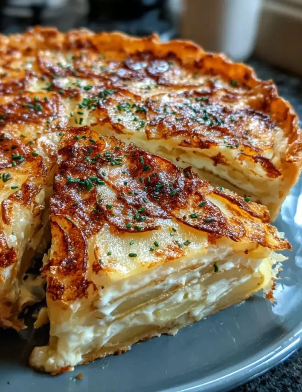 Creamy cheese and potato pie with a golden crust