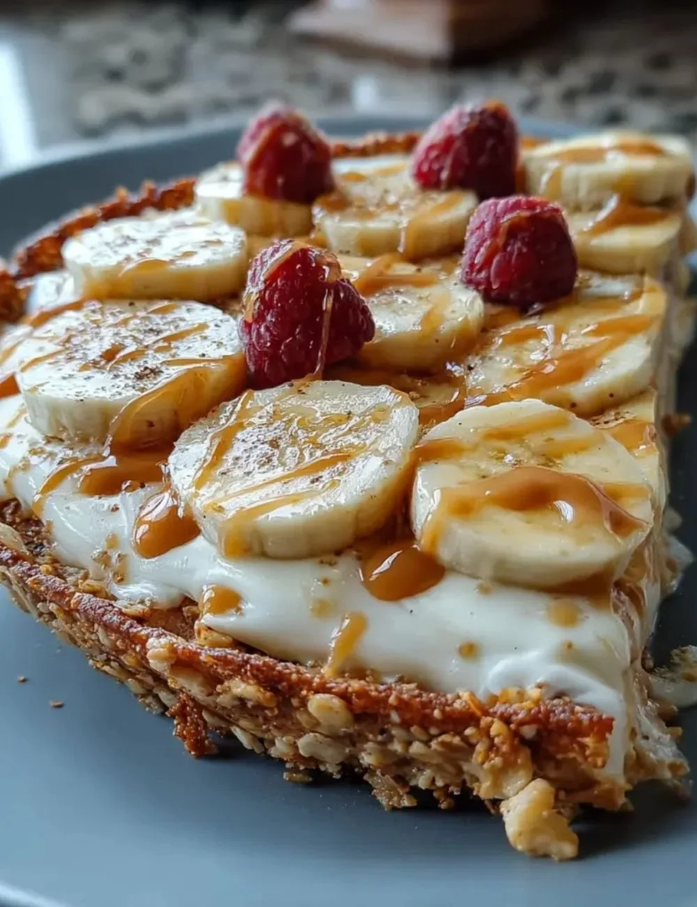 High-Protein Breakfast Pizza Bowl topped with fresh ingredients and cheese.