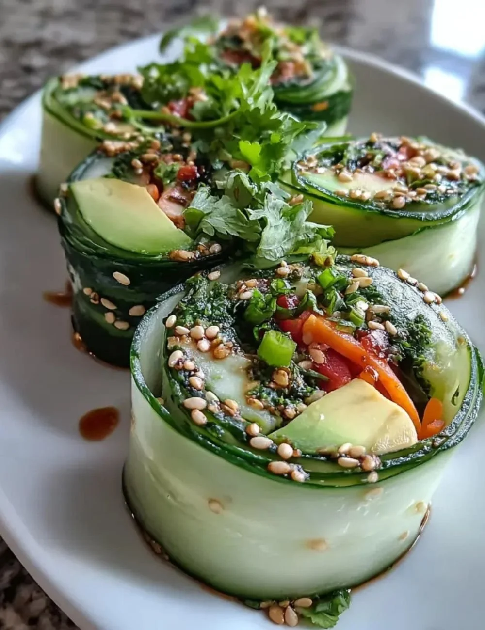 Light and refreshing cucumber avocado rolls on a plate