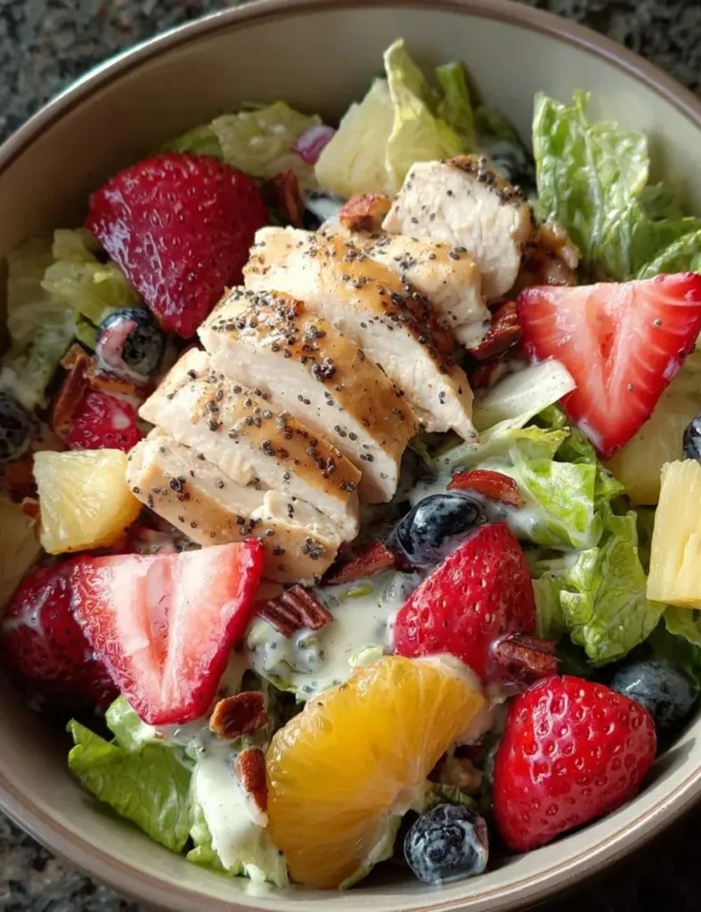 Delicious Panera Strawberry Poppyseed Salad with fresh strawberries and greens