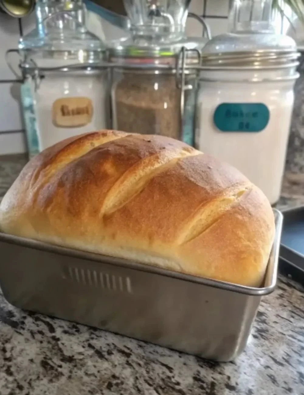Soft and fluffy homemade sourdough sandwich bread loaf