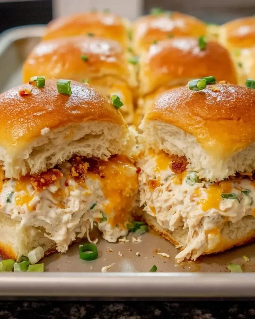 Delicious Crack Chicken Sliders served on a platter with toppings